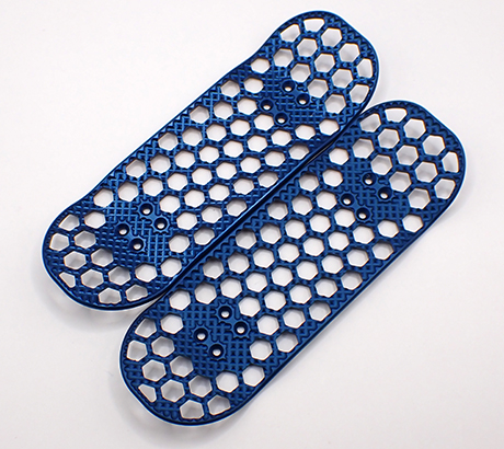 Metal fingerboard with machined grip in blue.