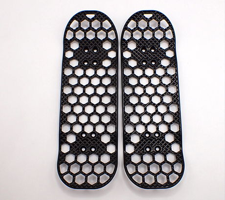 Metal fingerboard with machined grip in black.